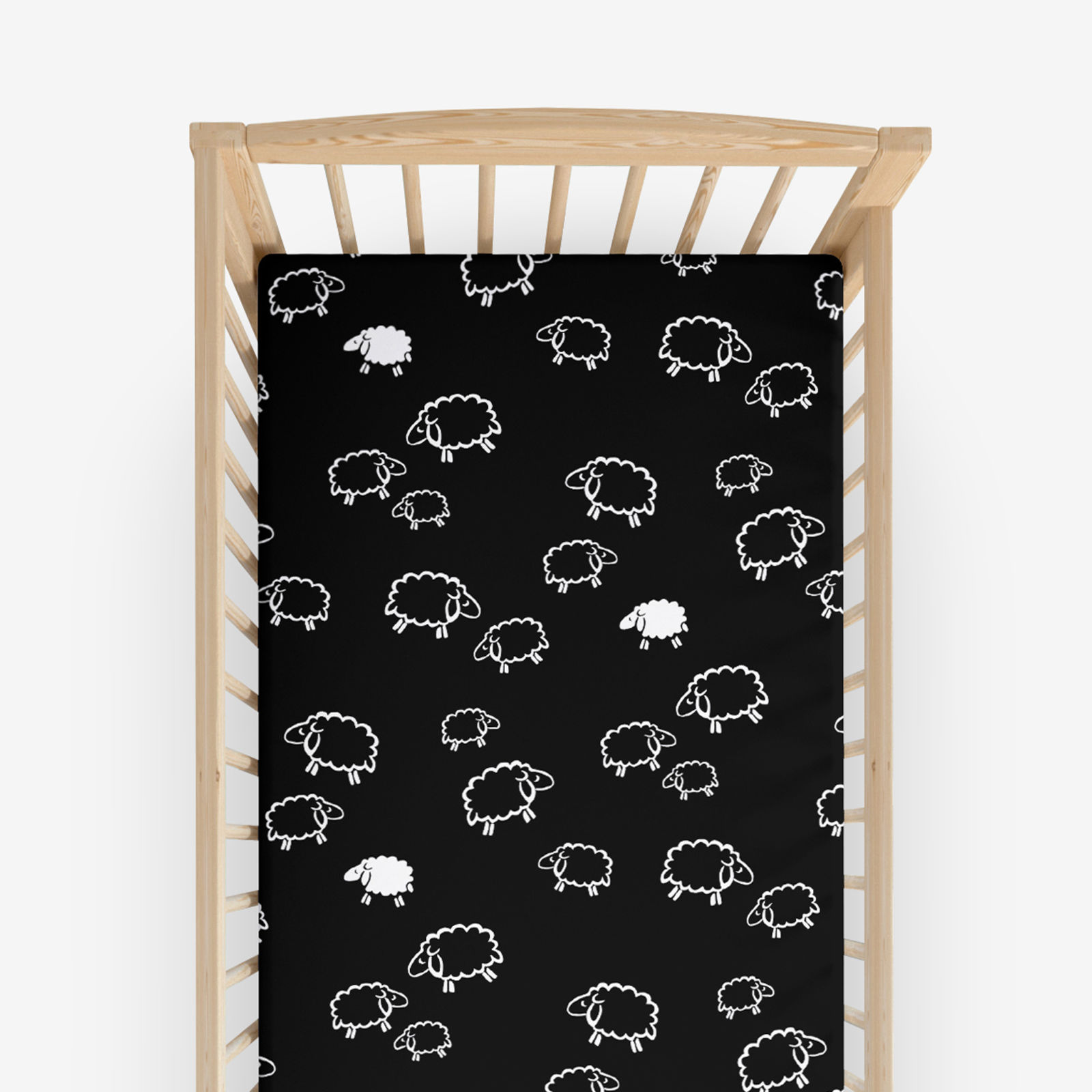 Bavlnená napínacia plachta do detské postieľky - biele ovečky na čiernom