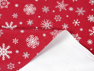 PVC obrusovina s textilným podkladom - vianočný vzor snehových vločiek na červenom - metráž š. 140 cm