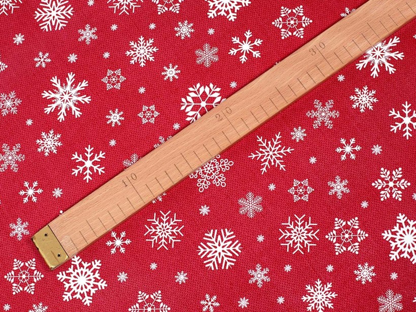 PVC obrusovina s textilným podkladom - snehové vločky na červenom
